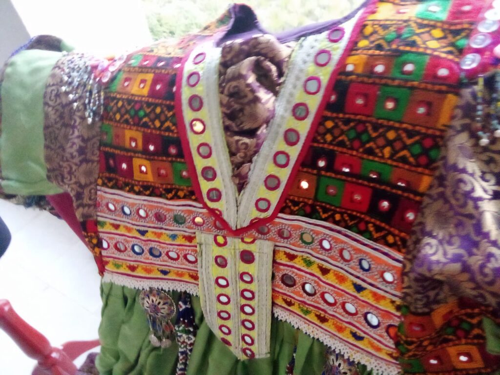 Beautiful colorful Afghani frock (HIstory of Afghani frocks)