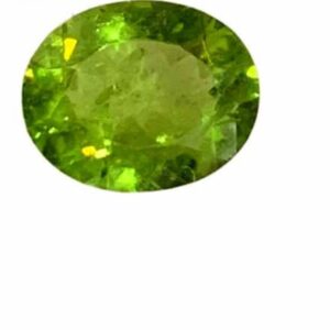 A vivid green Peridot gemstone with an oval cut, placed against a clean white background. The stone features sharp, symmetrical facets that reflect light delicately, highlighting its clarity and natural brilliance. The overall hue is a soft to medium olive green, evoking freshness and calm.