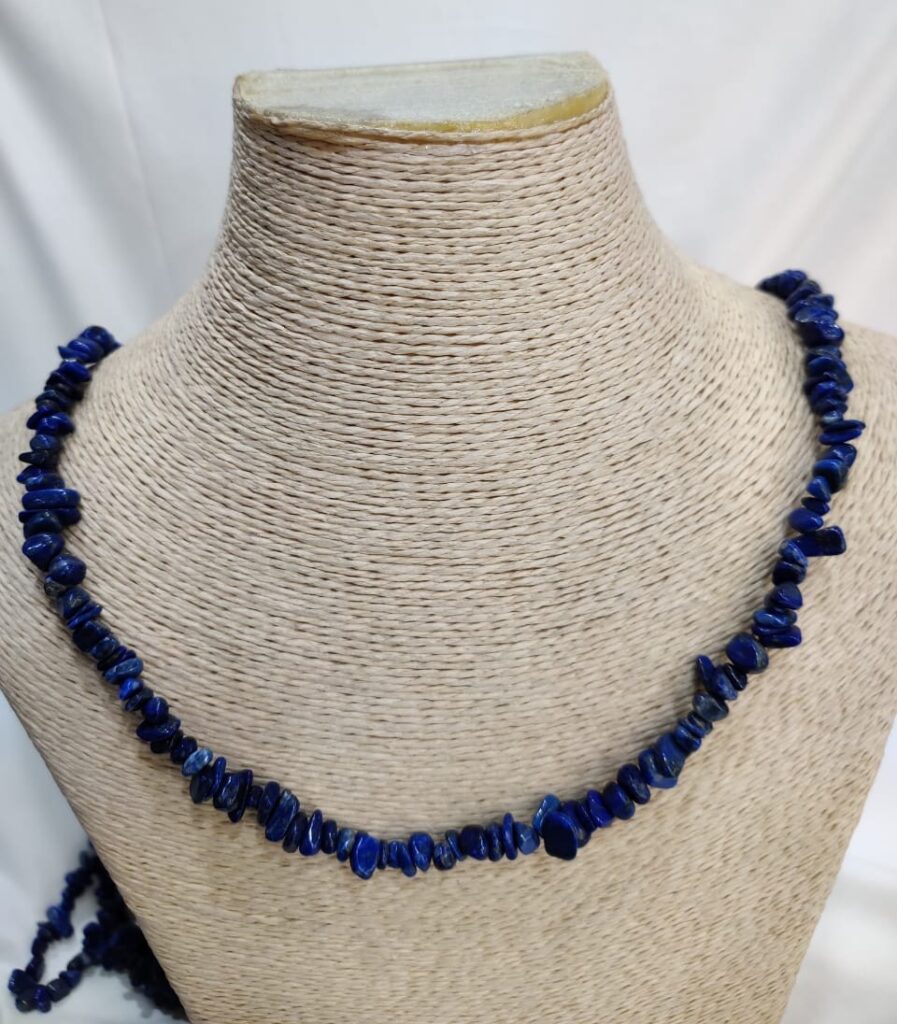Handcrafted Lapis Lazuli necklace featuring deep blue natural beads with flecks of golden pyrite, arranged in gentle symmetry. A calming, celestial design that evokes wisdom, serenity, and timeless Afghan heritage.