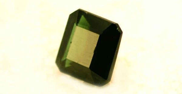 7 carat green tourmaline gemstone crystal showcasing rich color and healing properties curated by Dr. Bakht