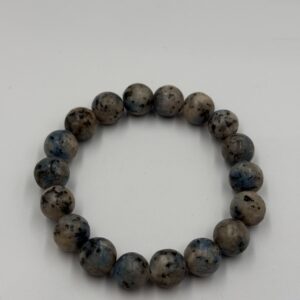 tiger eye bracelet with 8mm polished beads in shades of gold, brown and black.