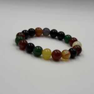 A mixed brown agate bracelet with 8mm polished beads in earthy tones of brown
