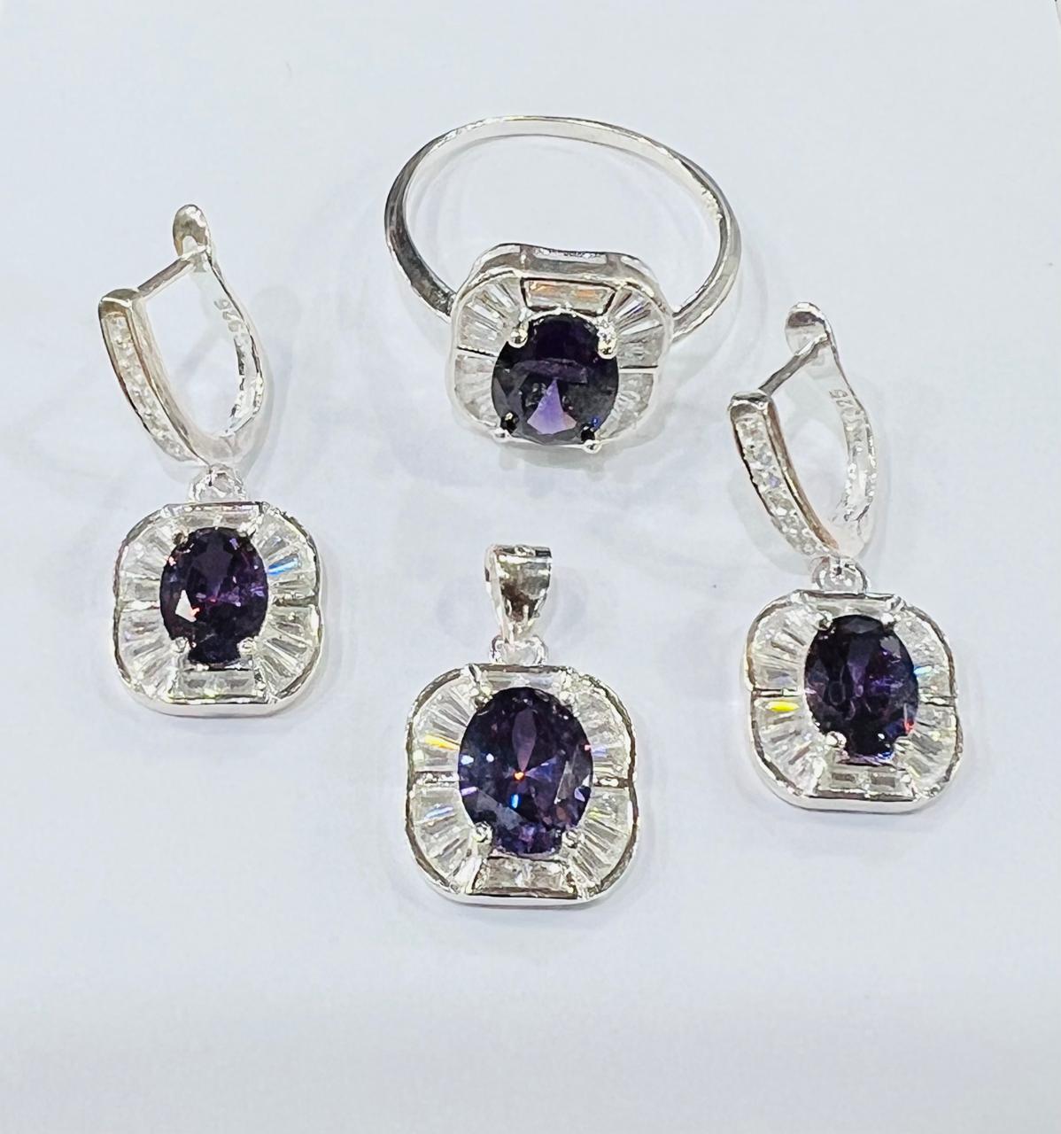 An elegant Italian rhodium silver jewelry set for women, featuring a necklace and earrings with sparkling clear zircon stones